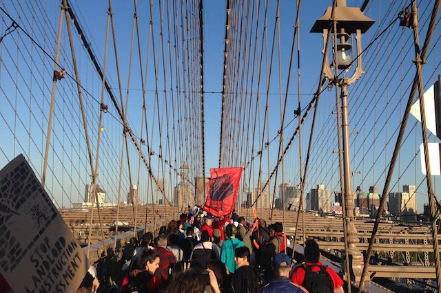 Tenants take the Brooklyn Bridge to protest 421-a in May (Emma Whitford/Gothamist).